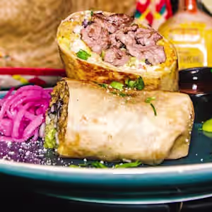 Don Pancho Villa signature dishes Mexplosion BurritoPancho NachosQuesadillasDPV's Signature Fajitas